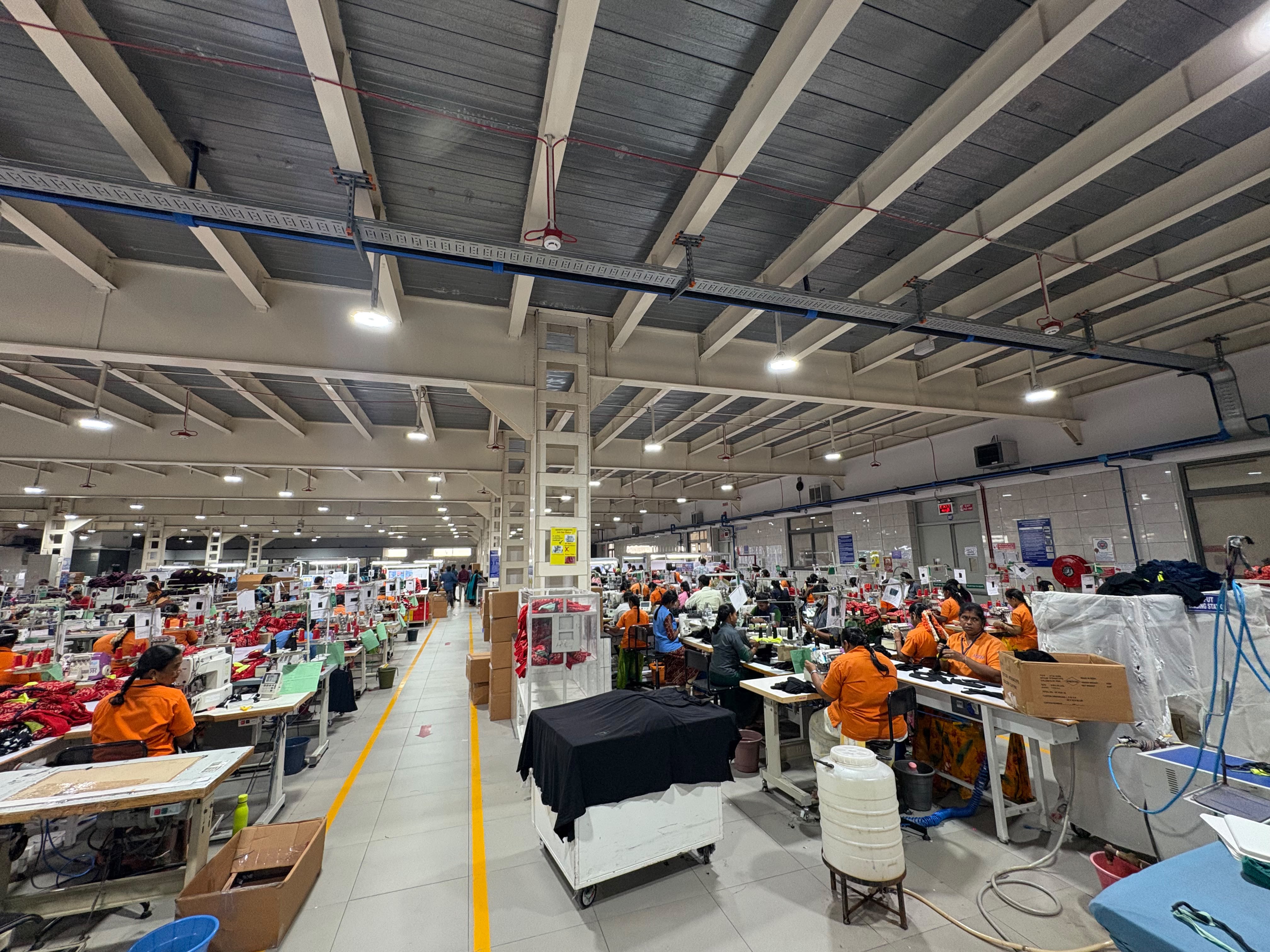 Production line with overhead piping and machinery